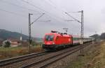 1116 215 mit OEC 563 bei Mauerkirchen (04.03.2008)