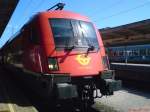 GySEV 1116 064 vor dem ankommenden IC 533  Carinthischer Sommer  aus Wien Sdbahnhof in Villach HBF