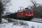 1116 256 mit einem gemischten Gterzug am 20.01.2009 in Haar (bei Mnchen).