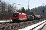 1116 112 mit einem gemischten Gterzug am 28.02.2009 in Aling.