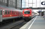 Na was glnzt denn da so? Es ist der Lack von 1116 110-6 als sie am 26.5.2009 mit EC 188 in Mnchen Hbf an den Prellbock rollt.