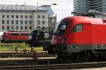 Taurus Parallelausfahrt in Mnchen Hbf: 1116 254 und 182 567 verlassen am 02.06.2009 den Mnchner Hbf.