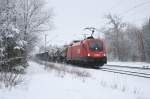 Mal ein Bild zur Abkhlung: 1116 157 mit einem gemischten Gterzug am Morgen des 21.02.2009 im winterlichen Haar.