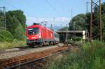 Die BR 1116 099-1 der BB am 17.7.09 mit einem EC Richtung Mnchen kurz hinter dem Bahnhof Rosenheim.