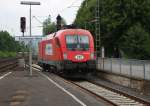 Whrend 293.02 fleiig am einschottern ist, macht 1116 234-4 der ITL Pause auf Gleis 1 im Bahnhof Eschwege West. 12.08.2009.