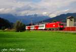 Bei bestem Licht passiert 1116 118-9 mit REX 1550 Salzburg Hbf.