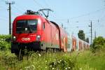 1116 161 mit einer DoSto Garnitur in auf dem Weg Richtung Wiener Neustadt bei der Durchfahrt in Atzgersdorf-Mauer am 28.5.2005