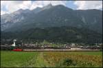 Ein Taurus bringt den OIC 542  Skicircus Saalbach Hinterglemm Leog , Wien Westbahnhof - Innsbruck Hbf, durch das Inntal in die Tiroler Landeshauptstadt.