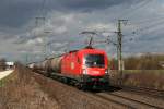 1116 140 mit einem Kesselwagenzug am 27.03.2010 in Obertraubling.