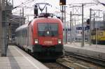 Taurus 1116 107 fhrt mit gemigtem Tempo mit EC634 nach Graz in Wien Meidling ein.