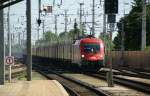 Taurus 1116 118 kommt von Ebenfurth aus mit einem Gterzug und wird in krze durch den Bahnhof Wr.Neustadt fahren.