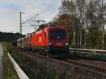 Die 1116 130 und ein Railjet Taurus mit Messwagen am 08.10.2010 unterwegs bei Hausbach.