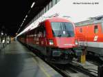 1116 084-3 mit einem EC in Wien Sdbahnhof, am 23-09-2002