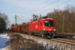 1116 177 mit einem gemischten Gterzug am 27.11.2010 in Haar.