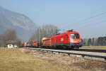 1116 029 mit einem gemischten Gterzug am 05.03.2011 bei Niederaudorf.