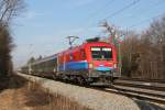 Rail Cargo Hungaria Taurus 1116 015 mit EC 111 am 12.03.2011 in Haar.