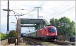 1116 268 mit dem russischen Schlafwagenzug von Nizza nach Moskau bei der berquerung des Donaukanals in Wien.