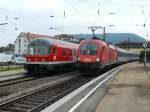 1116 260 mit dem EC nach Klagenfurt und daneben eine RB aus Stuttgart in Geislingen (Steige).