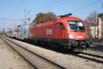 Die 1116 089-2 mit dem Rex aus Wien Meidling Richtung Wiener Neustadt in Wien Atzgersdorf am 26.09.2011