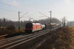 Gegenlichtaufnahme von 1116 120 mit einem gemischten Gterzug am 28.12.2011 bei Hilperting.