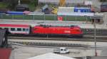 1116 122 mit OIC 865 (Innsbruck Hbf-Wien Westbahnhof) in Brixlegg.(4.4.2012)