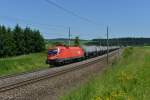 1116 076 mit einem Kesselzug Richtung Salzburg am 16.06.2012 unterwegs bei Pndorf.