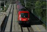 1116 174 am 15.7.2006 mit dem IC 656 „Therme Oberlaa Wien“ von Graz auf dem Weg nach Wien bei der Durchfahrt der Haltestelle Guntramsdorf.