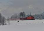 1116 080 mit einem Turnuszug am 16.02.2013 bei Fieberbrunn.