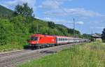 1116 128 fhrt mit dem EC 112 in Richtung Stuttgart und somit ihrem Ziel Frankfurt HBF entgegen.Bild entstand in Gingen(Fils)am 12.7.2013.