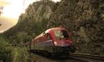 1116 017  Rail Cargo Hungaria  mit einem leeren Autotransportzug zwischen kurz vor Breitenstein am Semmering.