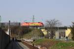 Von den BB gemietete GySEV 1116 065-2 vor einem Gterzug in Richtung Gyr am 08.Mrz 2014 vor der Brcke ber die Gyri Utca in Sopron.