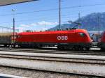 ÖBB - Lok 1116 051-4 vor Güterzug bei der ausfahrt aus dem SBB Bahnhof Buchs am 19.05.2014