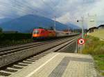 1116 060-5 mit EC 111 (München Hbf - Klagenfurt Hbf) am 13.9.2015 bei der Durchfahrt in Pusarnitz.