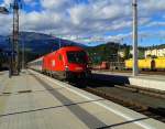 1116 117 mit EC 113 (Frankfurt (M) Hbf - Klagenfurt Hbf /-Zagreb Glavni kol.) am 20.9.2015 bei der Einfahrt in den Bahnhof Spittal-Millstättersee.