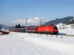 Die 1116 035 mit einem Turnuszug am 26.01.2013 unterwegs bei Fieberbrunn.