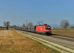 1116 035 mit einem Kohlezug am 22.02.2016 bei Langenisarhofen.