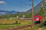 1116 028 fährt mir einer unbekannt gebliebenen Schwesterlokomotive mit dem IC 865 bei Braz den Arlberg hinauf.Bild vom 22.7.2015