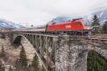 1116 058-9 mit EC 111 (München Hbf - Klagenfurt Hbf), am 13.3.2016 beim Überqueren der Angerschluchtbrücke.