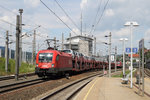 Vom Bahnsteig der S-Bahn-Station Salzburg-Gnigl wurde 1116 184 mit ihrem angehängten Güterzug dokumentiert.