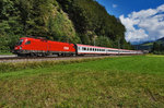 1116 030-8 fährt mit dem EC 111 (München Hbf - Klagenfurt Hbf), bei Mitterberghütten vorüber.