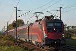 1116 203  Spirit of Linz  ist mit railjet 65 zwischen Himberg und Gramatneusiedl unterwegs.