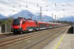 RJ 162  Transalptin  mit 1116 211 und zugehriger Garnitur in Frastanz bei der Durchfahrt in Frastanz Richtung Feldkrich.