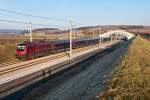 Railjet, unterwegs Richtung Westen, am 20.12.2012 auf der Neubaustrecke zwischen Wien und St. Plten bei Km 45, Hhe Perschling.