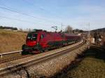 Die 1116 230 mit RJ am 21.12.2013 unterwegs bei Bergen.