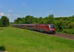 1116 214 mit einem umgeleiteten Railjet nach München am 08.06.2013 bei München-Feldmoching.