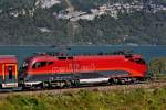 1116 211-4 Spirit of Munich an der Zugspitze des Railjet von Zürich HB nach Wien Hbf am 23.9.2014 bei Mühlehorn am Walensee.