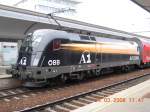 Der A1-Werbetaurus 1116 280-7 verlt am 24.3.2008 mit einem Regionalzug den Bahnhof Floridsdorf.