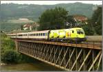 Werbelok 1116 033 Telekom Austria fhrt mit EC 536  Jacques Lemans  von Villach nach Wien.