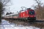 1116 271 (mit „Top Performer am Zug“ Schriftzug) mit IC 2083 am 15.02.2009 in Haar (bei Mnchen).