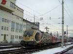 Die 1116 250 am 05.01.2008 mit dem REX nach Hallein bei der Ausfahrt aus Salzburg Hbf.